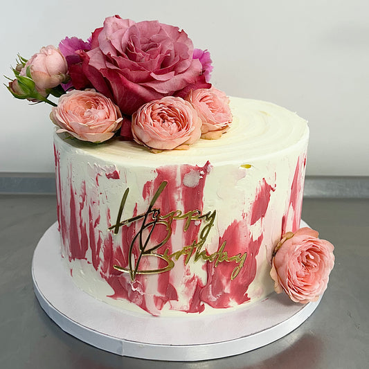 Geburtstagstorte rosa mit Blumen